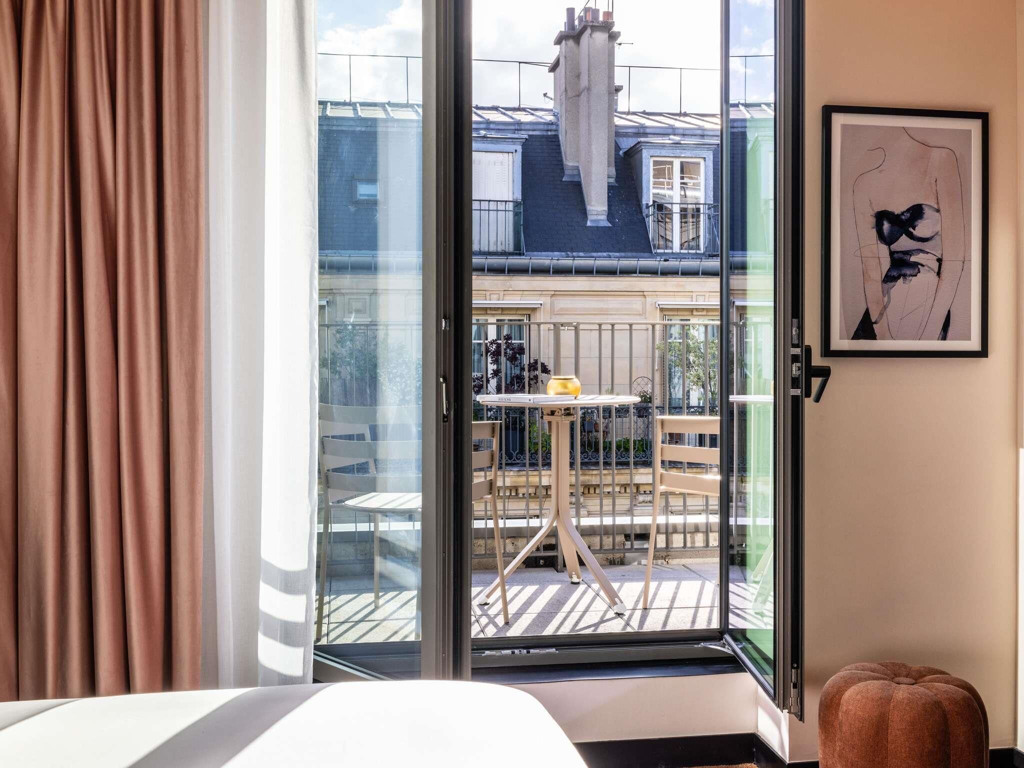 Chambre Deluxe, 1 très grand lit, balcon (Eiffel Tower View) | Literie de qualité supérieure, surmatelas