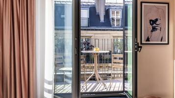 Chambre Deluxe, 1 trÚs grand lit, balcon (Eiffel Tower View) | Literie de qualité supérieure, surmatelas