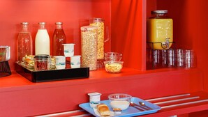 A breakfast buffet with various food items and beverages. - hotelF1 Genève Saint-Julien-En-Genevois (Rénové) (Viry)