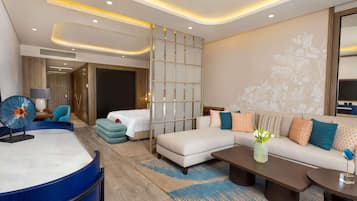 Premium Room Beach Side | Ropa de cama de alta calidad y minibar con artículos gratuitos