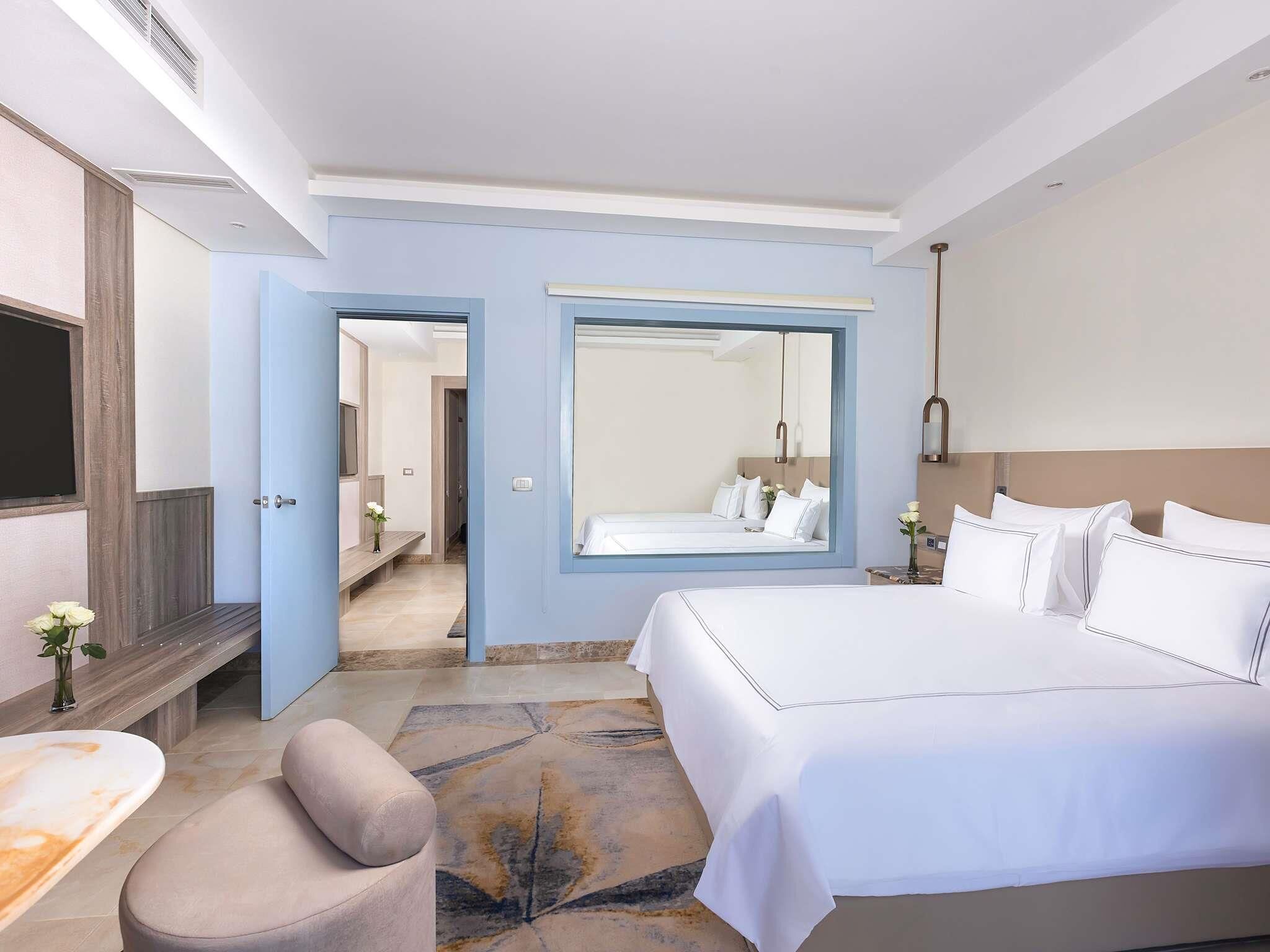 Habitación familiar, 2 camas matrimoniales | Ropa de cama de alta calidad y artículos del minibar gratis 