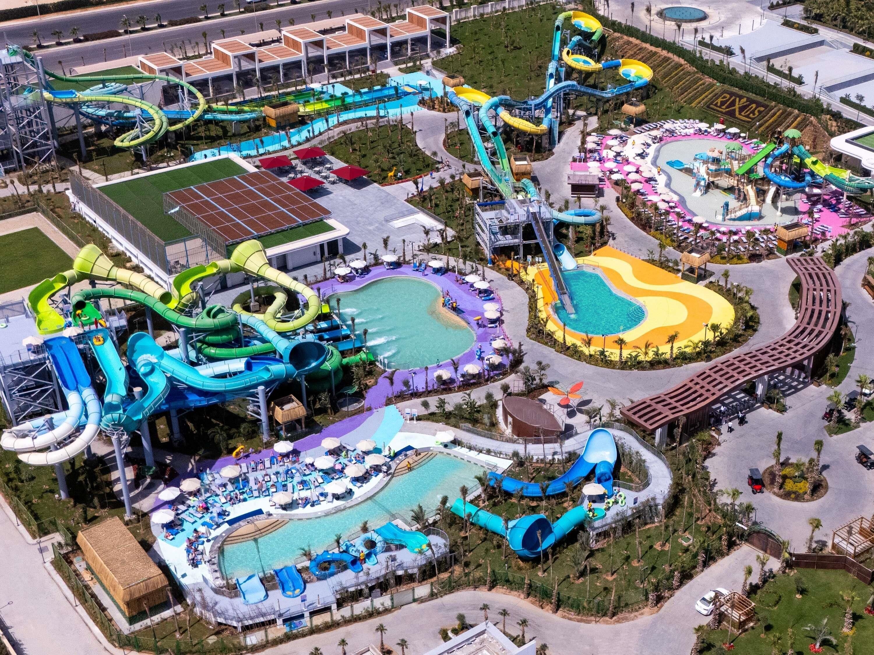 A water park with multiple slides and pools.