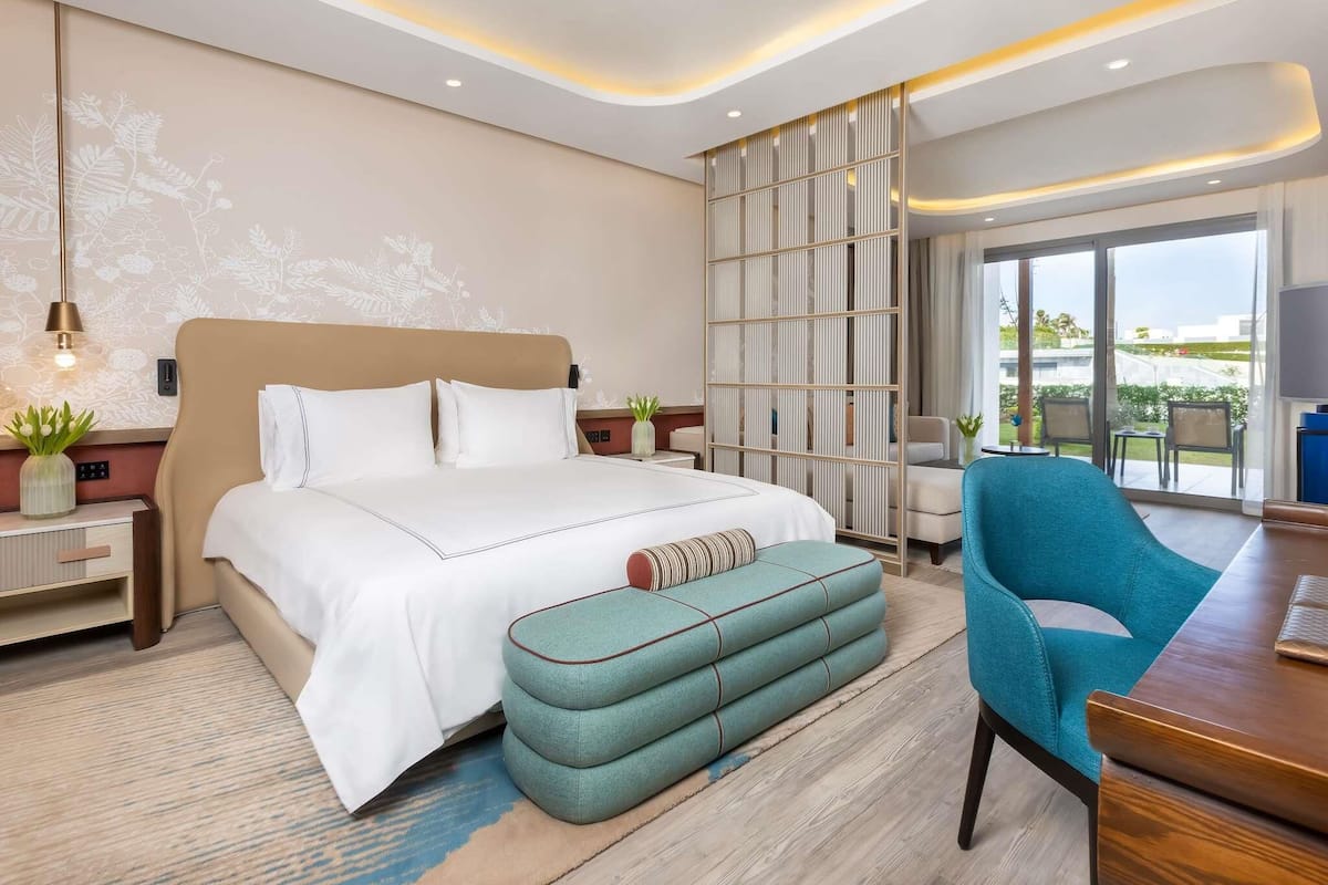 Premium Room Beach Side | Ropa de cama de alta calidad y artículos del minibar gratis