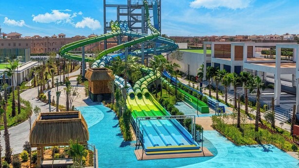 A water park with multiple slides and a large pool area. - Rixos Radamis Sharm El Sheikh (Sharm El Sheikh)