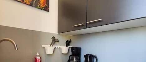 Microwave, coffee/tea maker, cookware/dishes/utensils