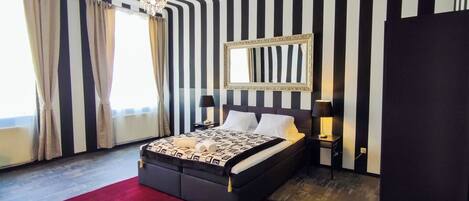 1 slaapkamer, een strijkplank/strijkijzer, wifi, beddengoed