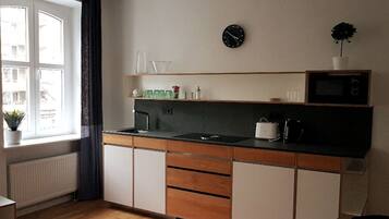 Fridge, microwave, stovetop, coffee/tea maker