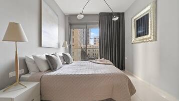 2 dormitorios, tabla de planchar con plancha, cuna de viaje y wifi