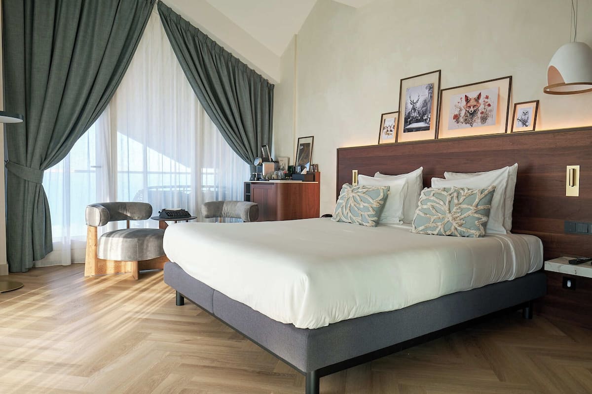 Deluxe tweepersoonskamer, uitzicht op zee | Luxe beddengoed, een gratis minibar, geluiddichte muren, gratis wifi