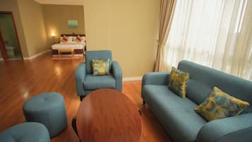 Junior Suite | Living area | 20-inch LCD TV with satellite channels
