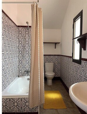 Regadera y secadora de cabello