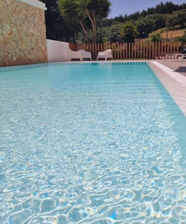 10 outdoor pools, pool umbrellas, sun loungers