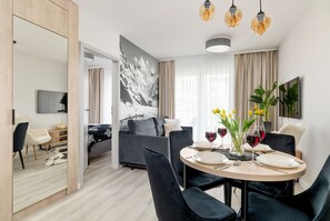 Apartment, 1 Bedroom, Sauna, Mountainside | Living room | 50-inch TV with digital channels - Apartment With the SPA by Renters (Zakopane)