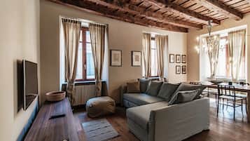 Apartment | Living area | 30-inch flat-screen TV with digital channels