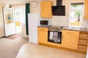Fridge, microwave, oven, coffee/tea maker