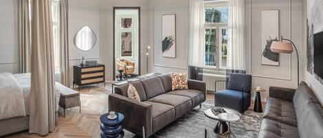 Luxury Apartment | Living area | 60-cm flat-screen TV with satellite channels