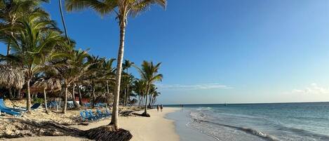 Private beach nearby, white sand, sun loungers, beach towels