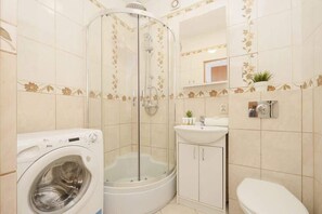 Shower, hair dryer, shampoo