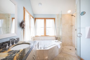 Shower, hair dryer, towels, shampoo