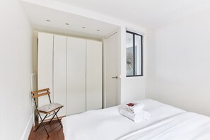 1 bedroom, desk, iron/ironing board, travel cot