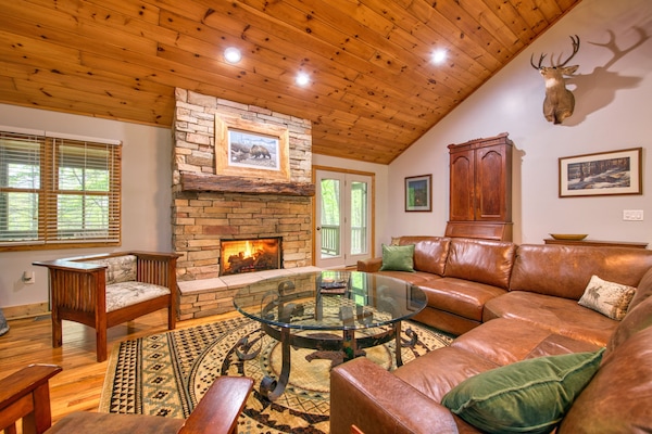 Cozy seating around gas fireplace in living room