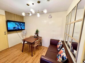 Family Condo | Living area | Flat-screen TV - Seawind Condo 2 BR Near Airport & Samal (Davao)