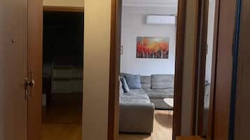 Apartment, 1 Bedroom | Living area | Flat-screen TV