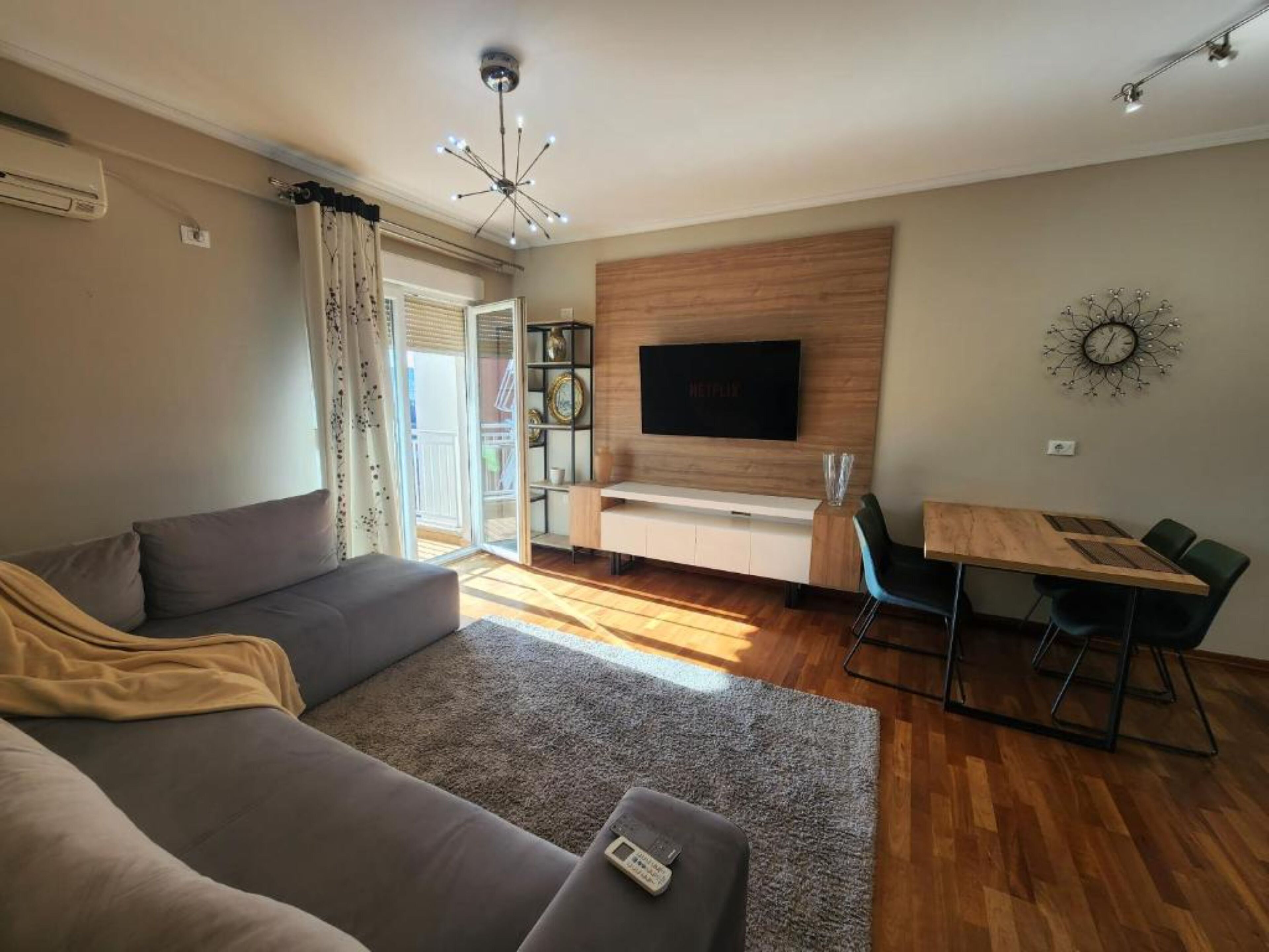 Apartment, 1 Bedroom | Living room | Flat-screen TV