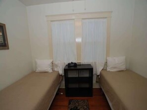 2 dormitorios, tabla de planchar con plancha, wifi gratis y ropa de cama