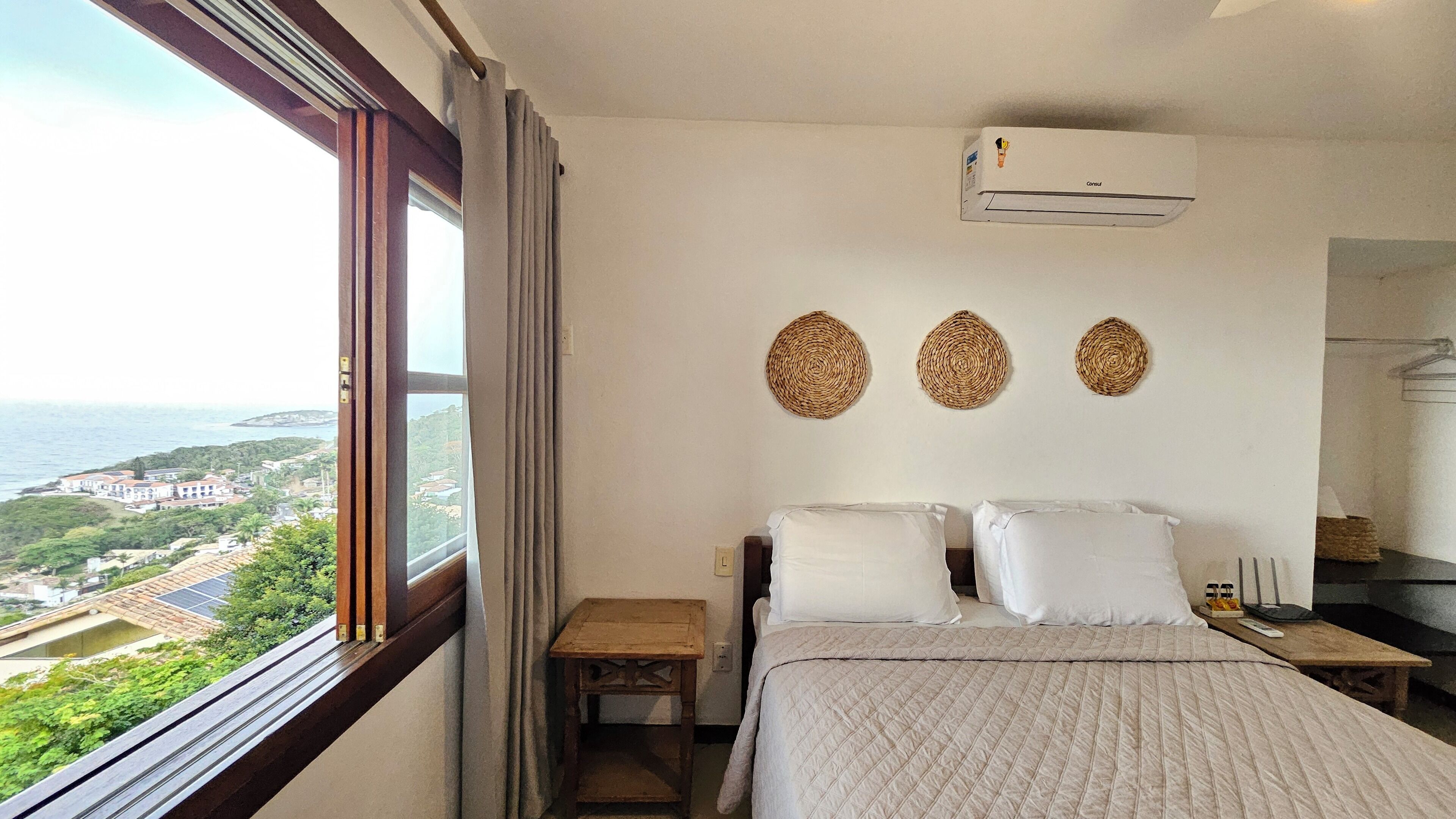 Suite, vista al mar | Minibar, cortinas blackout, tabla de planchar con plancha y wifi gratis 