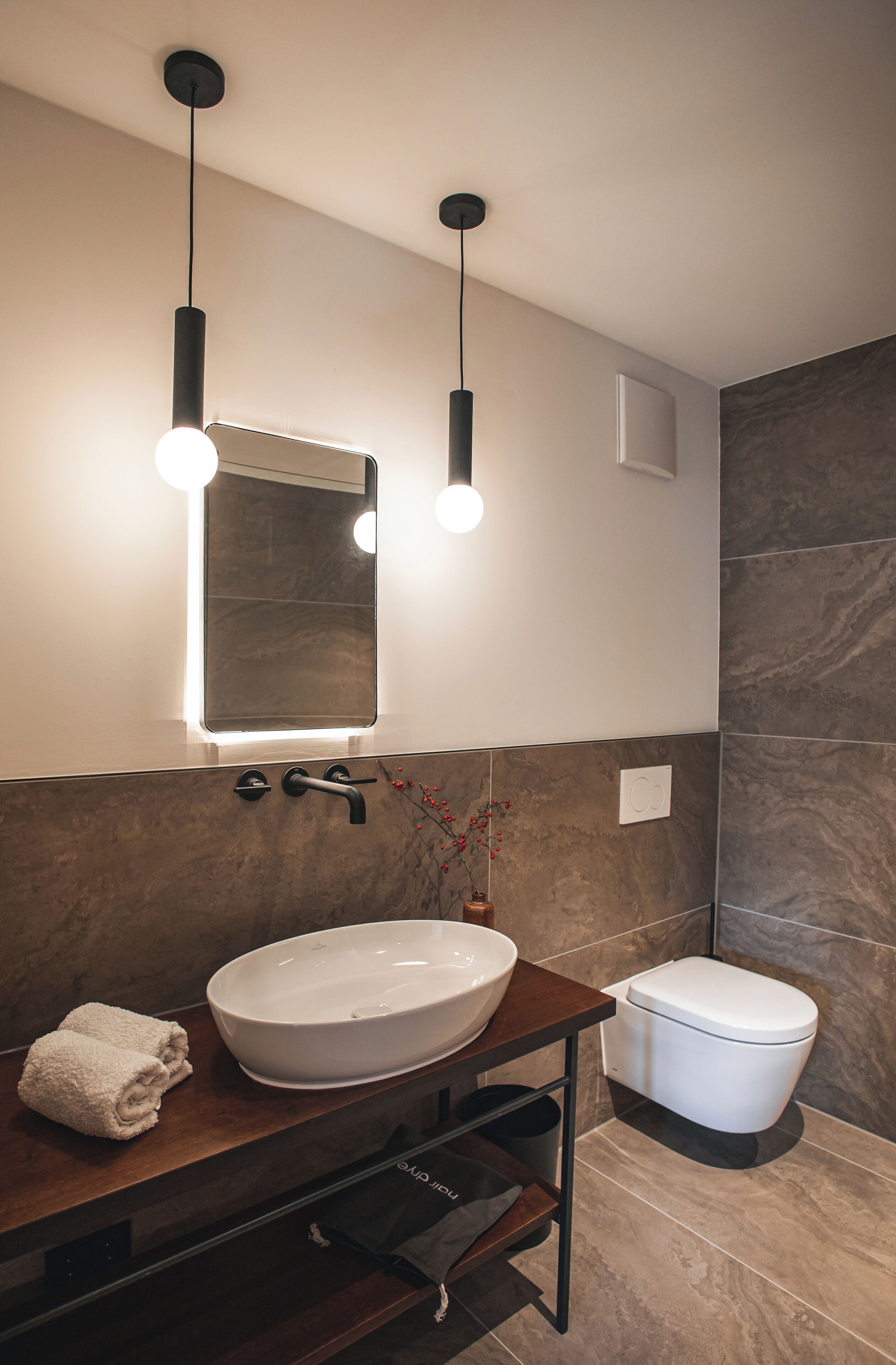 Shower, rainfall showerhead, hair dryer, towels
