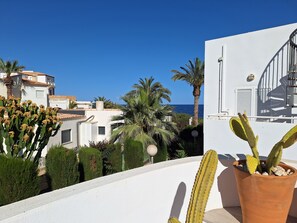 Property grounds - 50 meters to the Sea Apartment, pool,  a base for tourism or just a quiet rest. (Cuevas del Almanzora)