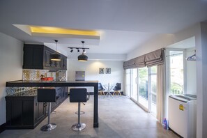 Fridge, stovetop, electric kettle, cookware/dishes/utensils - Spacious Apartment in The Top Attractions of Siem Reap - 002 (Krong Siem Reap)