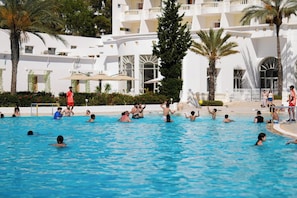 Indoor pool, outdoor pool, open 10:00 AM to 6:00 PM, pool umbrellas