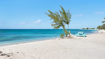 On the beach, sun-loungers, beach towels