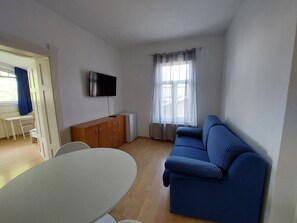 Apartamento família | Área de estar