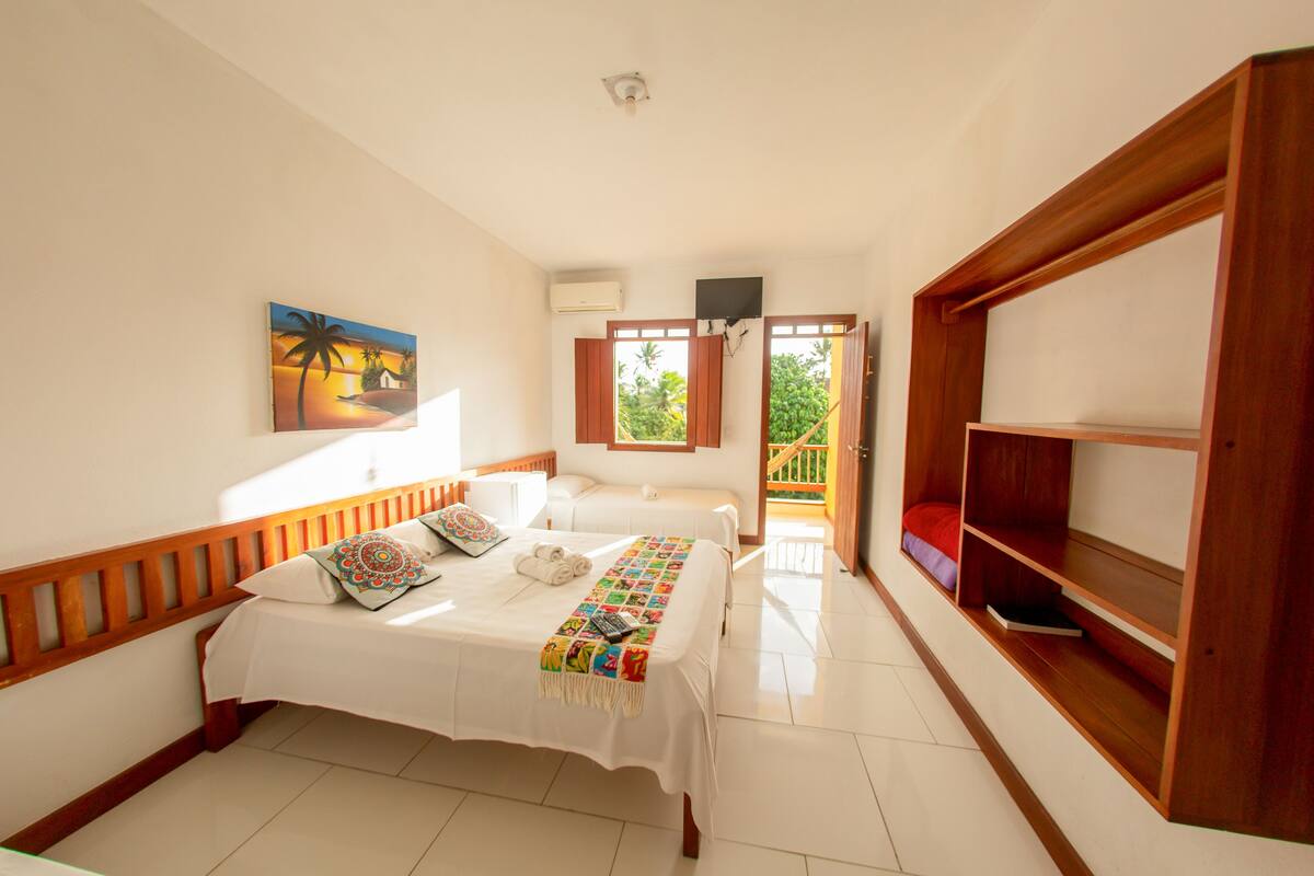 Family Room | Minibar, WiFi (free), bed sheets