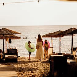 On the beach, white sand, free beach cabanas, sun loungers