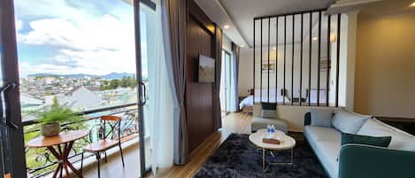 Departamento Deluxe | Área de sala de estar | Televisión de 40 pulgadas con canales por cable