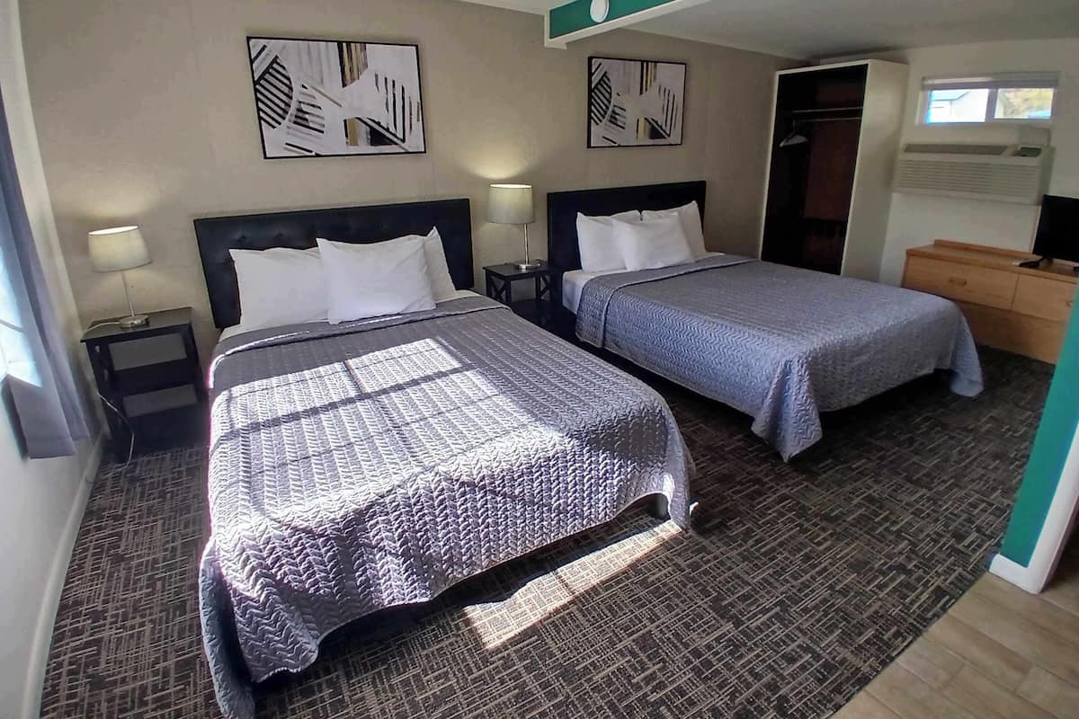 Premium bedding, pillowtop beds, blackout drapes, iron/ironing board
