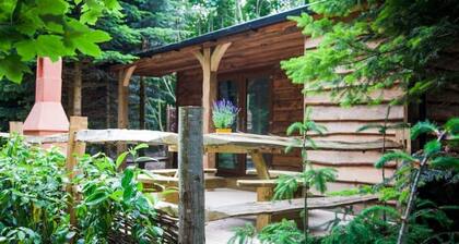 Romantic retreat tucked away in a peaceful wooded location.
Private hot tub.