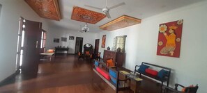 Deluxe Double Room | Living area | 42-inch flat-screen TV with satellite channels, TV, ping pong