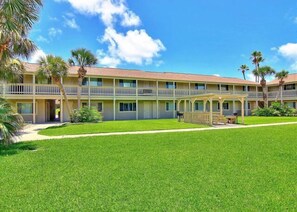 Guests can enjoy balconies and a peaceful outdoor space amidst lush surroundings.