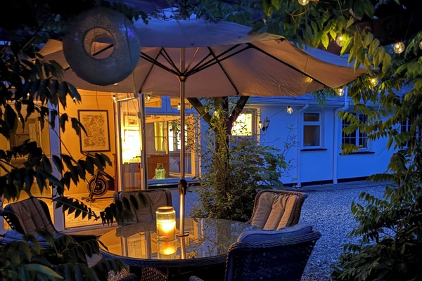 Outdoor dining area by night