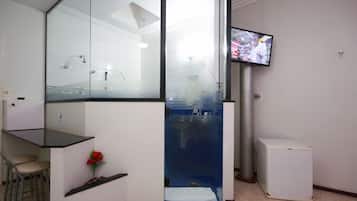 Suite | Bathroom | Hair dryer, bathrobes, slippers, towels
