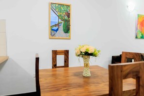Standard Cottage | Dining - Lucian Cottages (Kampala)