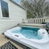 Caravansleeps6-hottub-garden-waterwonderland