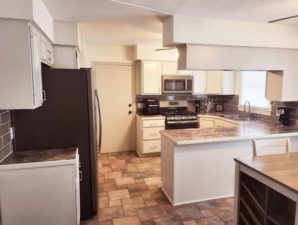 Fridge, microwave, oven, stovetop - Our Home Away From Home! (Lansing)