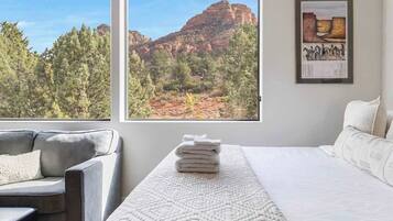 1 bedroom, desk, iron/ironing board, travel crib