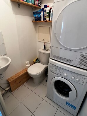 Hair dryer, towels, soap, shampoo